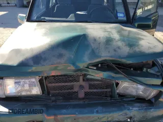 1996 Geo Tracker z VIN 2CNBE1363T6921541, wystawiony jako Copart lot #81647384 z przebiegiem 61 806 mil mil oraz Szkody całkowita. Historia ofert i sprzedaży dostępna na DreamBid. Obrazek 13.