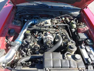2002 Ford Mustang GT Deluxe with VIN 1FAFP42X42F103211, listed as a IAAI auction lot 42015683 with 210,545 mi miles. Bid and sale history available at carsss.com. Image 10.