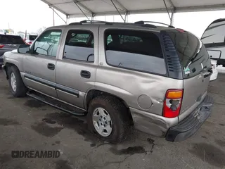 2002 Chevrolet Tahoe LS with VIN 1GNEC13T62R311933, listed as a IAAI auction lot 41895509 with 236,603 mi miles and . Bid and sale history available at DreamBid. Image 3.