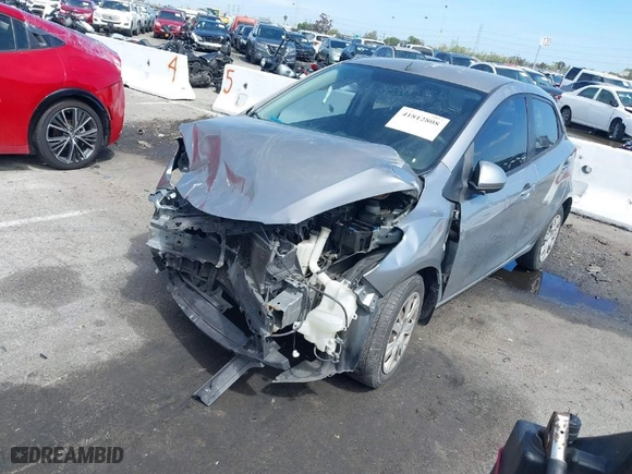 2013 Mazda Mazda2 Sport with VIN JM1DE1KZ5D0159977, listed as a IAAI auction lot 41812808 with 155,036 mi miles. Bid and sale history available at carsss.com. Image 2.