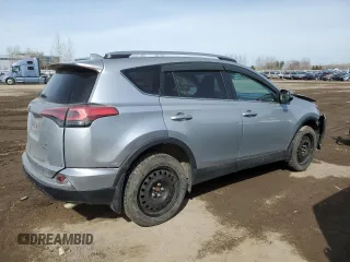 2018 Toyota RAV4 LE with VIN 2T3BFREV9JW754527, listed as a Copart auction lot 48119415 with 217,777 mi miles and Salvage Title. Bid and sale history available at carsss.com. Image 3.