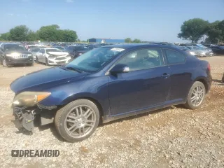 2007 Scion tC Spec z VIN JTKDE167470155733, wystawiony jako Copart lot #57350645 z przebiegiem 226 749 mil mil oraz Szkoda całkowita • Salvage title. Historia ofert i sprzedaży dostępna na DreamBid. Obrazek 1.