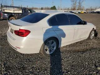 2017 BMW 3 Series 330i with VIN WBA8B9C57HK675589, listed as a Copart auction lot 43075315 with 89,016 mi miles and Salvage Title. Bid and sale history available at carsss.com. Image 3.