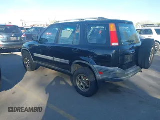 2000 Honda CR-V EX with VIN JHLRD1866YC025833, listed as a IAAI auction lot 42039440 with 238,599 mi miles. Bid and sale history available at carsss.com. Image 3.