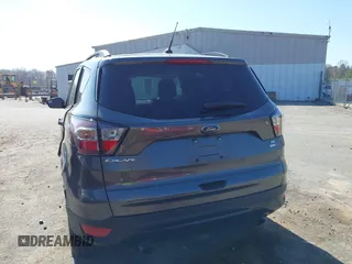 2017 Ford Escape SE with VIN 1FMCU9GD9HUC84906, listed as a IAAI auction lot 41762989 with 147,721 mi miles. Bid and sale history available at carsss.com. Image 16.