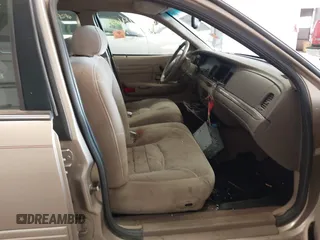 2000 Ford Crown Victoria LX z VIN 2FAFP74W2YX110824, wystawiony jako IAAI lot #42274655 z przebiegiem 93 653 mil mil oraz . Historia ofert i sprzedaży dostępna na DreamBid. Obrazek 5.