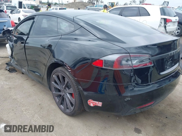 2017 Tesla Model S 60 with VIN 5YJSA1E12HF195965, listed as a IAAI auction lot 41946148 with 63,992 mi miles and . Bid and sale history available at DreamBid. Image 3.