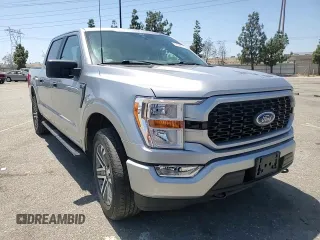 2021 Ford F-150 XL z VIN 1FTEW1EP5MKE42668, wystawiony jako Copart lot #57350175 z przebiegiem 39 727 mil mil oraz Szkoda całkowita • Salvage title. Historia ofert i sprzedaży dostępna na DreamBid. Obrazek 13.