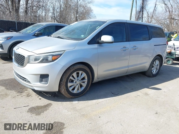 2016 Kia Sedona L with VIN KNDMA5C17G6103195, listed as a IAAI auction lot 41663528 with 322,257 mi miles. Bid and sale history available at carsss.com. Image 2.