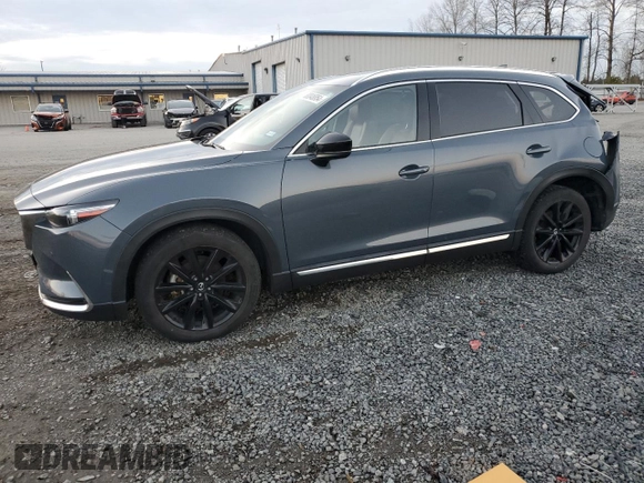 2021 Mazda CX-9 Carbon Edition с VIN JM3TCBDY1M0538672, выставлен на аукционе Copart как лот 80048854 с пробегом 53 979 миль миль и Списание • Salvage title. История ставок и продаж доступна на DreamBid. Изображение 1.