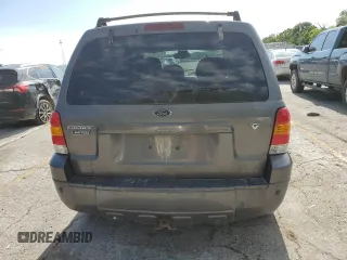 2005 Ford Escape Limited with VIN 1FMYU041X5KC72704, listed as a Copart auction lot 57819655 with 179,469 mi miles and Salvage title. Bid and sale history available at DreamBid. Image 6.