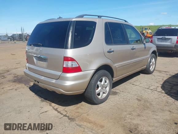 2002 Mercedes-Benz M 320/430/500 with VIN 4JGAB75E92A334273, listed as a IAAI auction lot 41831832 with 132,896 mi miles and . Bid and sale history available at DreamBid. Image 4.