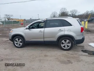 2013 Kia Sorento EX with VIN 5XYKUCA67DG380083, listed as a IAAI auction lot 41957996 with 73,598 mi miles and . Bid and sale history available at DreamBid. Image 14.