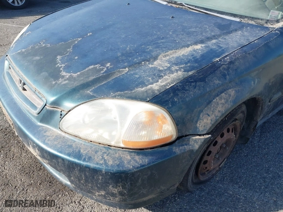 1997 Honda Civic DX with VIN 1HGEJ622XVL073128, listed as a IAAI auction lot 41721903 with 177,616 mi miles. Bid and sale history available at carsss.com. Image 6.