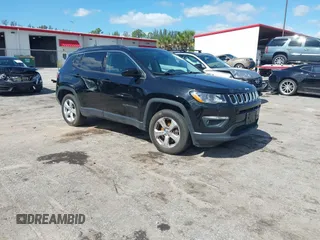2018 Jeep Compass Latitude z VIN 3C4NJDBBXJT313943, wystawiony jako IAAI lot #42270764 z przebiegiem 70 187 mil mil oraz . Historia ofert i sprzedaży dostępna na DreamBid. Obrazek 1.