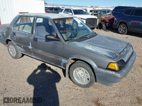 1985 Honda Civic z VIN JHMAK5433FS009299, wystawiony jako IAAI lot #41576709 z przebiegiem 152 094 mil mil oraz . Historia ofert i sprzedaży dostępna na DreamBid. Obrazek 1.
