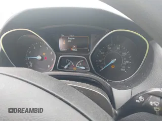 2015 Ford Focus SE with VIN 1FADP3F29FL258781, listed as a IAAI auction lot 41963223 with 121,286 mi miles and . Bid and sale history available at DreamBid. Image 7.