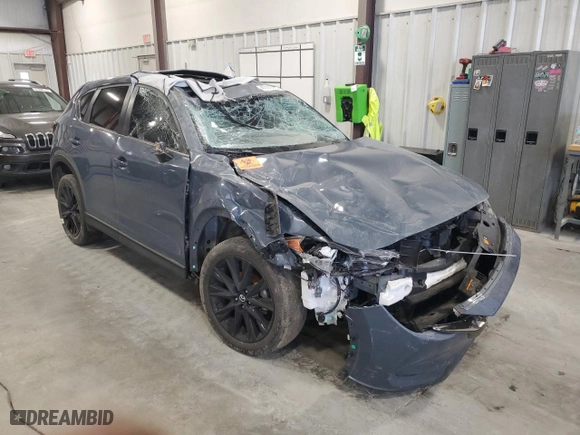 2021 Mazda CX-5 Touring with VIN JM3KFACM1M0422707, listed as a Copart auction lot 47111015 with 36,206 mi miles and Salvage Title. Bid and sale history available at carsss.com. Image 4.