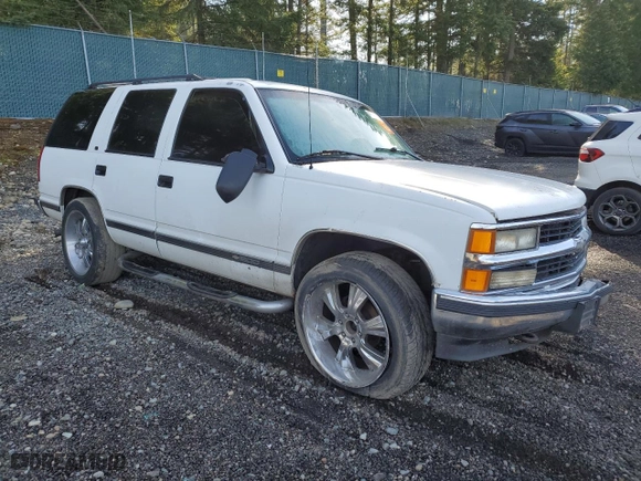 1997 Chevrolet Tahoe with VIN 1GNEK13R8VJ372825, listed as a Copart auction lot 47395435 with 211,491 mi miles and Salvage Title. Bid and sale history available at carsss.com. Image 4.