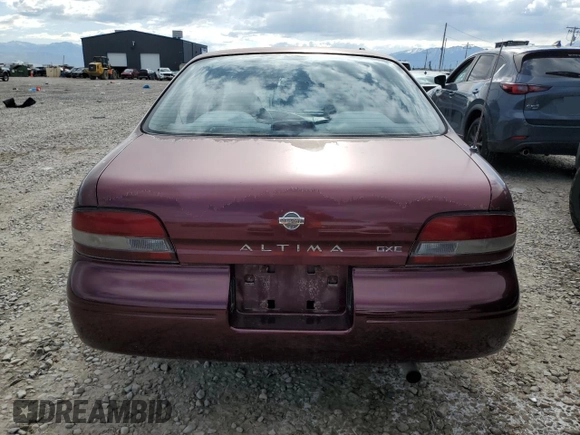 1997 Nissan Altima XE z VIN 1N4BU31DXVC181006, wystawiony jako Copart lot #57670815 z przebiegiem 98 202 mil mil oraz Szkoda całkowita • Salvage title. Historia ofert i sprzedaży dostępna na DreamBid. Obrazek 6.