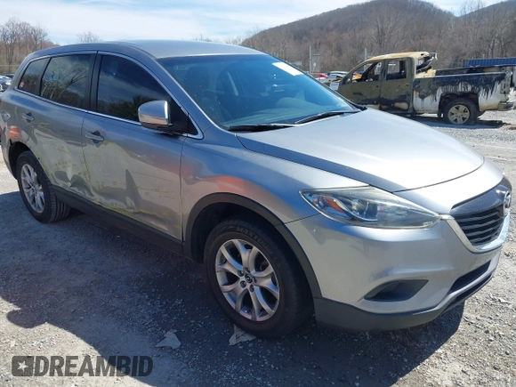2015 Mazda CX-9 Sport with VIN JM3TB2BA7F0450544, listed as a IAAI auction lot 41812565 with 81,727 mi miles and . Bid and sale history available at carsss.com. Image 1.