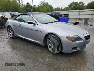 2007 BMW 6 Series M6 z VIN WBSEK93537CS32914, wystawiony jako Copart lot #59816795 z przebiegiem 82 046 mil mil oraz Czysty tytuł • Clean title. Historia ofert i sprzedaży dostępna na DreamBid. Obrazek 4.