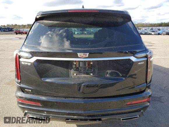 2021 Cadillac XT6 Sport z VIN 1GYKPGRS0MZ215942, wystawiony jako Copart lot #84830084 z przebiegiem 29 930 mil mil oraz Szkoda całkowita • Salvage title. Historia ofert i sprzedaży dostępna na DreamBid. Obrazek 6.