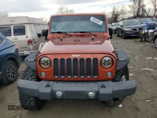 2014 Jeep Wrangler Unlimited Rubicon with VIN 1C4BJWFG0EL187243, listed as a Copart auction lot 45865005 with 53,064 mi miles and Salvage title. Bid and sale history available at DreamBid. Image 5.