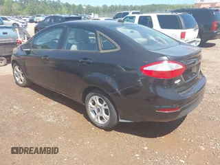 2015 Ford Fiesta SE with VIN 3FADP4BJ9FM113645, listed as a IAAI auction lot 41970671 with 138,026 mi miles. Bid and sale history available at carsss.com. Image 3.