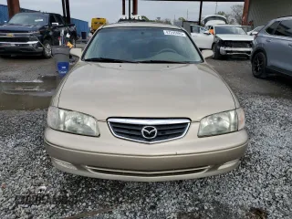 2001 Mazda 626 LX with VIN 1YVGF22CX15238033, listed as a Copart auction lot 47245985 with 91,735 mi miles and Salvage Title. Bid and sale history available at carsss.com. Image 5.