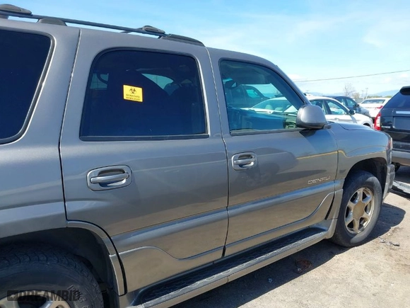 2005 GMC Yukon Denali with VIN 1GKEK63U35J149963, listed as a IAAI auction lot 41829530 with 243,575 mi miles. Bid and sale history available at carsss.com. Image 13.