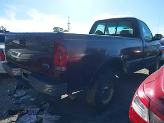 1998 Ford F-150 with VIN 1FTDF18W7WNA07117, listed as a IAAI auction lot 41395851 with 276,845 mi miles and . Bid and sale history available at DreamBid. Image 4.