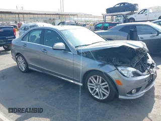 2009 Mercedes-Benz C 300 Sport with VIN WDDGF54X49R065000, listed as a IAAI auction lot 42139499 with 103,586 mi miles and . Bid and sale history available at DreamBid. Image 1.