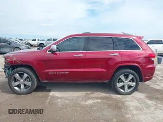 2015 Jeep Grand Cherokee Overland z VIN 1C4RJFCT1FC198611, wystawiony jako IAAI lot #42427311 z przebiegiem 116 140 mil mil oraz . Historia ofert i sprzedaży dostępna na DreamBid. Obrazek 15.