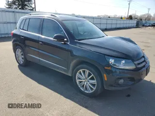 2012 Volkswagen Tiguan SE with VIN WVGAV7AX3CW605413, listed as a Copart auction lot 49847145 with 143,499 mi miles and Salvage Title. Bid and sale history available at DreamBid. Image 4.