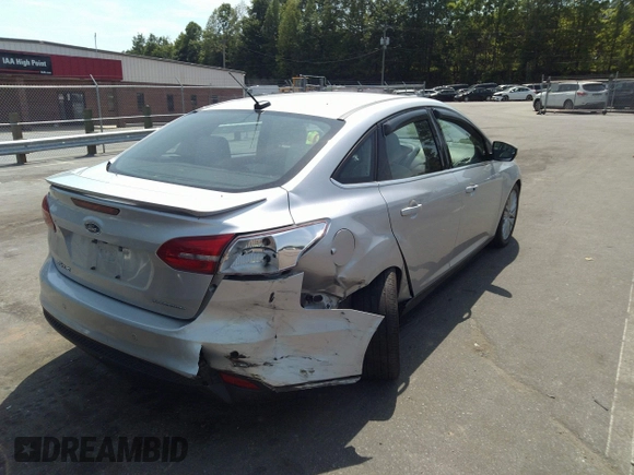 2018 Ford Focus Titanium with VIN 1FADP3J26JL280723, listed as a IAAI auction lot 42319900 with 149,583 mi miles and . Bid and sale history available at DreamBid. Image 4.