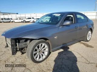 2011 BMW 3 Series 328i xDrive with VIN WBAPK5G52BNN28598, listed as a Copart auction lot 61337865 with 136,944 mi miles and Salvage title. Bid and sale history available at DreamBid. Image 1.