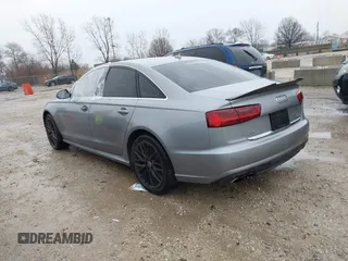 2016 Audi A6 2.0T Premium Plus with VIN WAUGFAFC1GN014536, listed as a IAAI auction lot 41937616 with 122,417 mi miles. Bid and sale history available at carsss.com. Image 3.