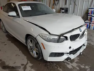 2016 BMW 2 Series 228i xDrive with VIN WBA1G9C53GVX97088, listed as a IAAI auction lot 41617710 with 72,978 mi miles. Bid and sale history available at carsss.com. Image 18.