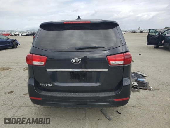 2016 Kia Sedona L with VIN KNDMA5C10G6184184, listed as a Copart auction lot 50974325 with 144,549 mi miles and Salvage Title. Bid and sale history available at carsss.com. Image 6.
