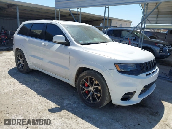 2017 Jeep Grand Cherokee SRT with VIN 1C4RJFDJ0HC699537, listed as a IAAI auction lot 41781500 with 105,640 mi miles. Bid and sale history available at carsss.com. Image 1.