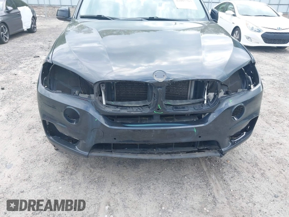 2016 BMW X5 xDrive35i z VIN 5UXKR0C55G0P26466, wystawiony jako IAAI lot #42005793 z przebiegiem 200 889 mil mil oraz . Historia ofert i sprzedaży dostępna na DreamBid. Obrazek 6.