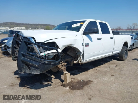 2012 Ram 2500 ST with VIN 3C6UD5HL1CG168724, listed as a IAAI auction lot 41865678 with 206,787 mi miles. Bid and sale history available at carsss.com. Image 2.