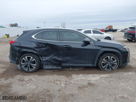 2019 Lexus UX with VIN JTHY3JBH8K2013667, listed as a IAAI auction lot 41635062 with 75,863 mi miles. Bid and sale history available at carsss.com. Image 13.