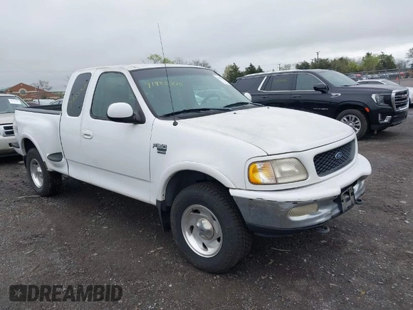 1998 Ford F-150 XL with VIN 2FTRX08L1WCB04886, listed as a IAAI auction lot 41983810 with 185,909 mi miles and . Bid and sale history available at DreamBid. Image 1.