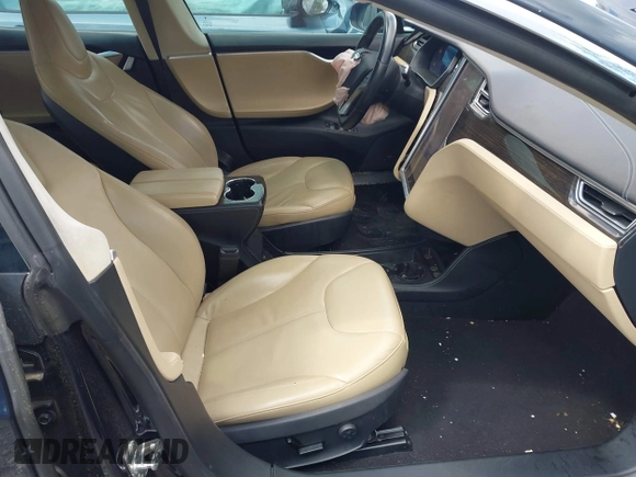 2014 Tesla Model S 60 with VIN 5YJSA1H15EFP43884, listed as a IAAI auction lot 41993180 with 78,305 mi miles and . Bid and sale history available at DreamBid. Image 5.