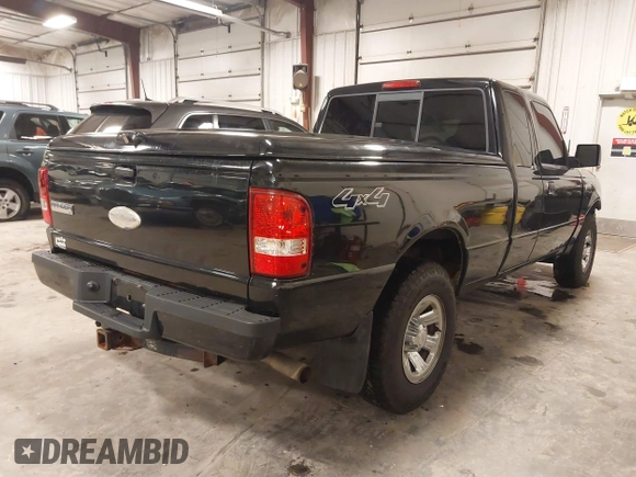 2009 Ford Ranger XLT with VIN 1FTZR45E79PA63934, listed as a IAAI auction lot 41441326 with 153,140 mi miles. Bid and sale history available at carsss.com. Image 4.