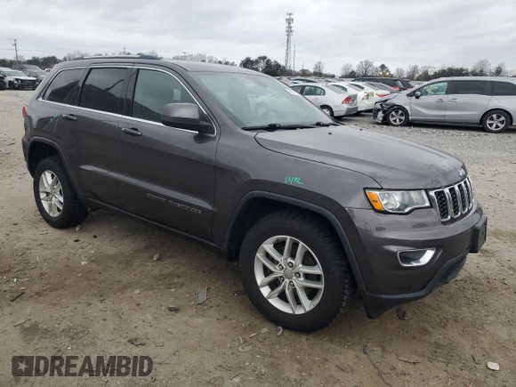 2017 Jeep Grand Cherokee Laredo with VIN 1C4RJFAG9HC750302, listed as a Copart auction lot 47601615 with 101,729 mi miles and Salvage Title. Bid and sale history available at carsss.com. Image 4.