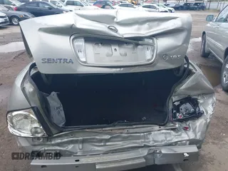 2004 Nissan Sentra S z VIN 3N1CB51D64L912410, wystawiony jako IAAI lot #41925283 z przebiegiem 100 351 mil mil oraz . Historia ofert i sprzedaży dostępna na DreamBid. Obrazek 6.