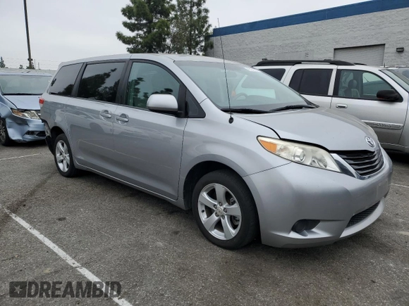 2012 Toyota Sienna with VIN 5TDKA3DC4CS014867, listed as a Copart auction lot 43191655 with 169,517 mi miles and Salvage Title. Bid and sale history available at DreamBid. Image 4.